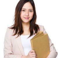 young-businesswoman-hold-with-folder-2021-08-30-07-20-17-utc.jpg